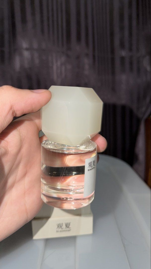 To Summer Nude Eau de Parfum 30ml (Category: Fragrance & Deodorants) located in Cainta. Submitted by coolwhale.804534 (Listing ID 1467338455, Image 3). Description: - Brand: To Summer Nude Eau de Parfum - Size: 30ml full bottle - Condition: Like new with original outer box and intact spray nozzle - Scent Profile: Fresh, clean, with subtle floral and skin musk notes - Design: Heavy glass bottle featuring a unique faceted cap - Perfect as an everyd
