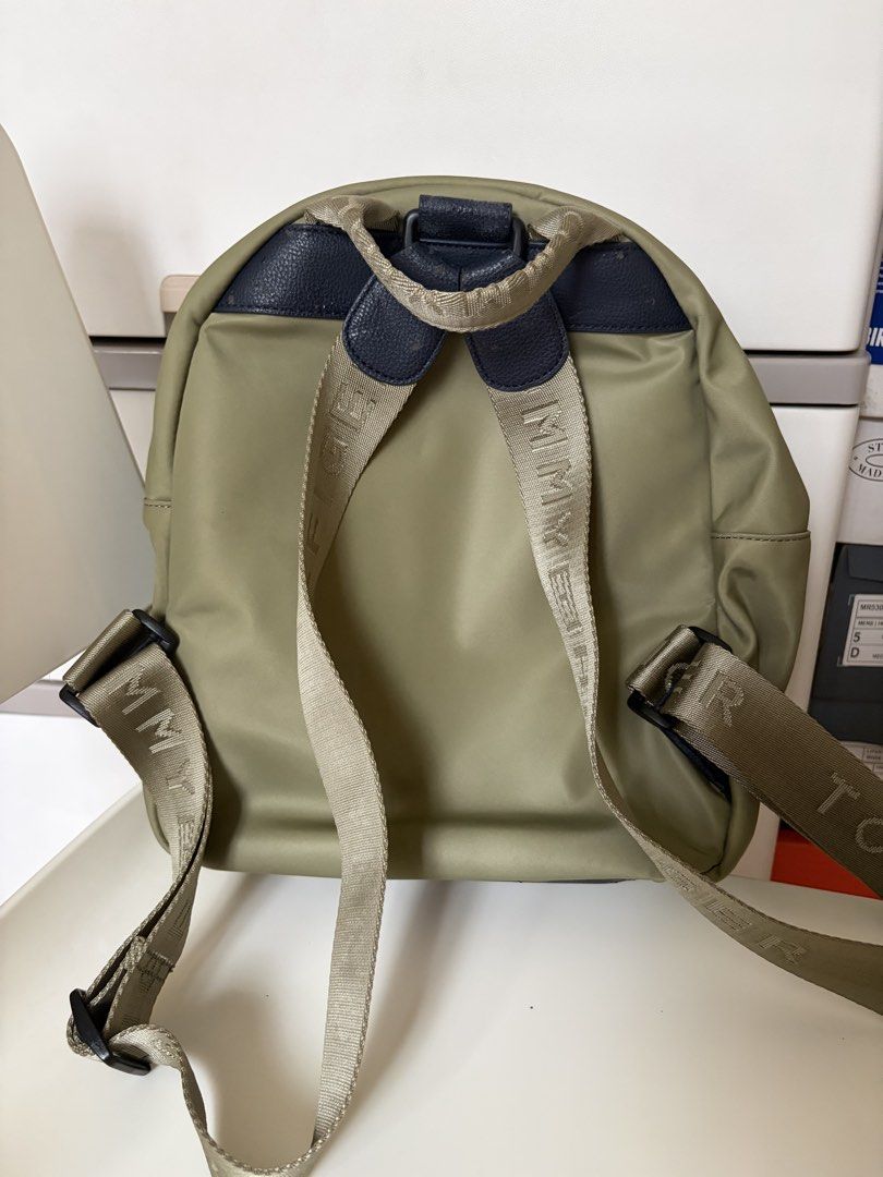 Tommy Hilfiger Olive Green Backpack (Category: Backpacks) located in Manila. Submitted by 8d2sn4py9663100 (Listing ID 1467184851, Image 2). Description: Original tommy hilfiger bag Rfs: not my style used once only Peeling due to poor storage conditions.