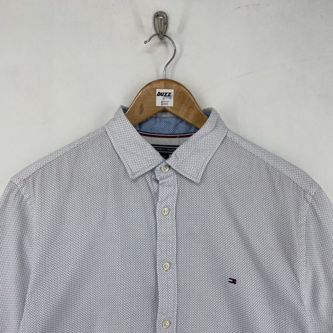 Tommy Hilfiger Pattern Button up Shortsleeve Polo (Category: Tshirts & Polo Shirts ) located in Manila. Submitted by buzz.garments (Listing ID 1467355468, Image 2). Description: Size: Medium on tag Dimensions(inches) -Width: 21” -Length : 31” -Pit To Cuff: 4 - color may vary due to lighting. please manage your expectations-minimal and unseen flaws must be considered..