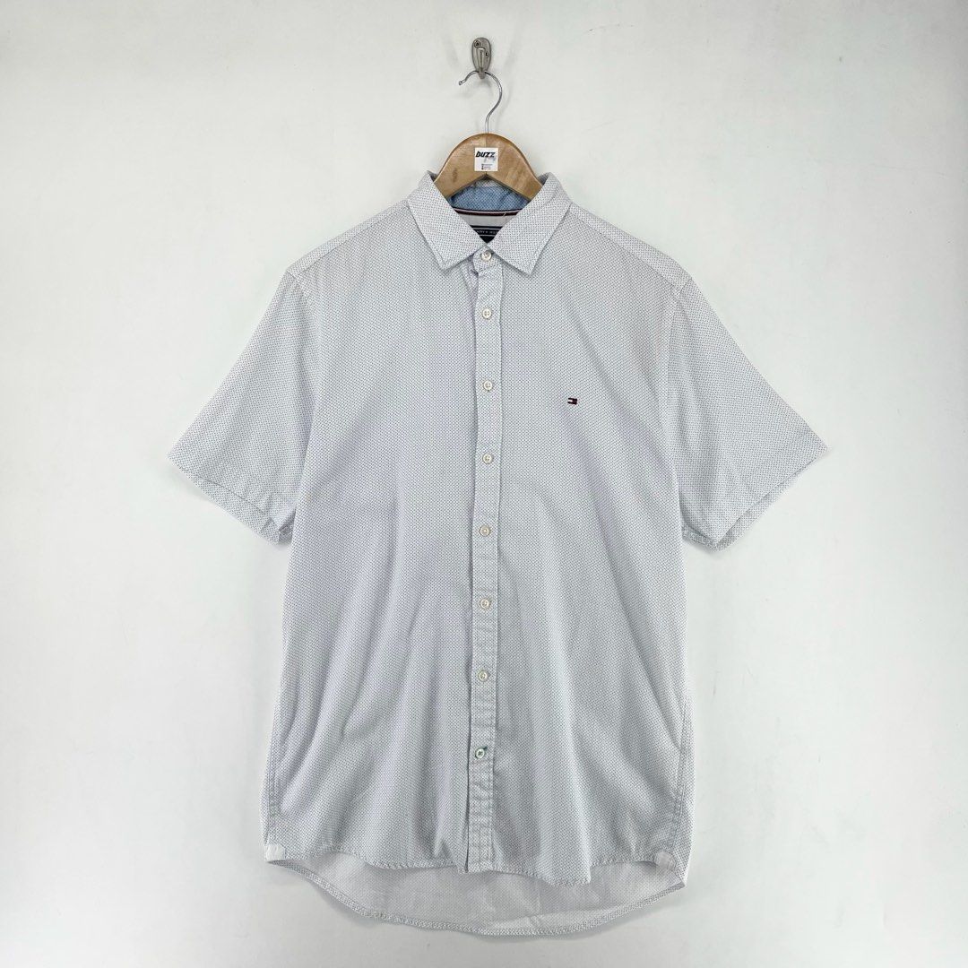 Tommy Hilfiger Pattern Button up Shortsleeve Polo (Category: Tshirts & Polo Shirts ) located in Manila. Submitted by buzz.garments (Listing ID 1467355468, Image 1). Description: Size: Medium on tag Dimensions(inches) -Width: 21” -Length : 31” -Pit To Cuff: 4 - color may vary due to lighting. please manage your expectations-minimal and unseen flaws must be considered..
