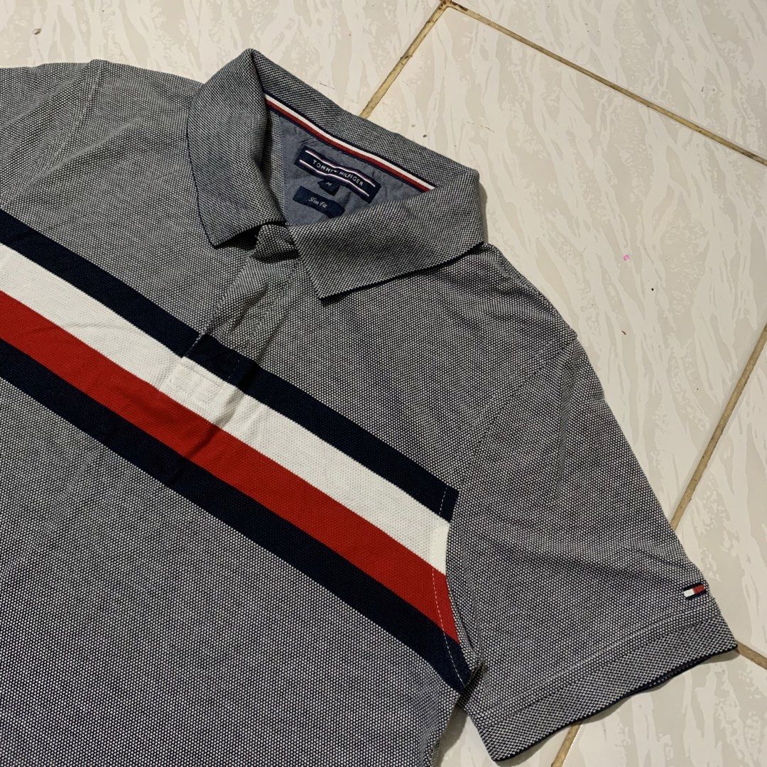 Tommy Hilfiger Polo Shirt (Category: Tshirts & Polo Shirts ) located in Cebu City. Submitted by johnferrer96412 (Listing ID 1467235789, Image 2). Description: Tommy Hilfiger Polo Shirt Medium Width 19 Length 26-27 Excellent condition Dm📩.