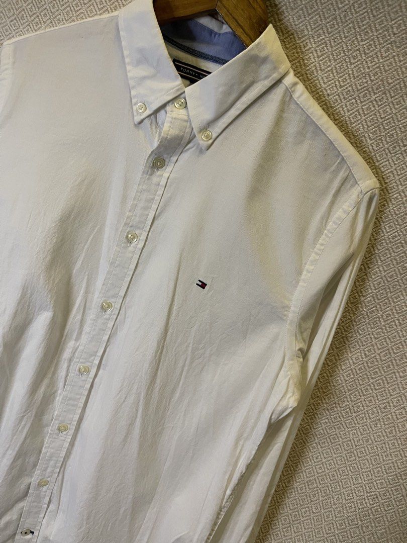 Tommy hilfiger white polo button down long sleeve (Category: Tshirts & Polo Shirts ) located in Manila. Submitted by hypestock_mnl (Listing ID 1467218346, Image 2). Description: - stylish - perfect for casual wear - great fit - in good condition - minimal signs of usage - 9/10 - money worth! - see pics for details/issue.