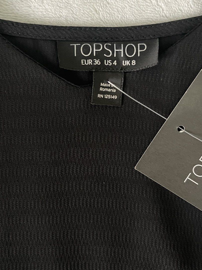 Topshop spaghetti strap cami (Category: Sleeveless) located in Mandaluyong City. Submitted by 9kconsumer.wind (Listing ID 1467244968, Image 1). Description: Bought this year 2021 and never been used.