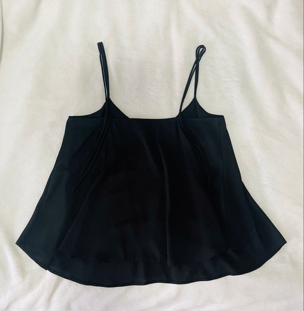 Topshop spaghetti strap cami (Category: Sleeveless) located in Mandaluyong City. Submitted by 9kconsumer.wind (Listing ID 1467244968, Image 3). Description: Bought this year 2021 and never been used.