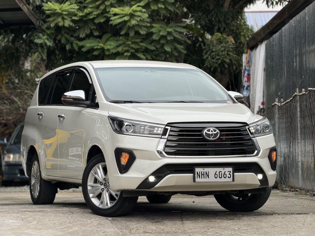 Toyota Innova (Category: Used Cars) located in Caloocan City. Submitted by mikeenash00 (Listing ID 1463706304, Image 1). Description: For Sale | Trade in | Financing Toyota Innova V D4D 2024 AT Top of the Line -Pearl White -DRL headlights -Led fog lamps -Diesel Engine -Clean quality interiors 💯 -Table tray -All Original -All Stock -27,000 legit mileage only (with casa records) -Original Documents -Bring your trusted mechanic 💯 -Registered! -Thi
