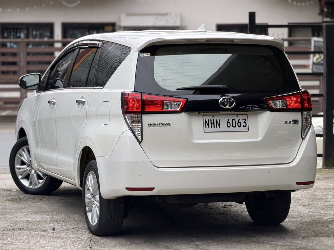 Toyota Innova (Category: Used Cars) located in Caloocan City. Submitted by mikeenash00 (Listing ID 1463706304, Image 2). Description: For Sale | Trade in | Financing Toyota Innova V D4D 2024 AT Top of the Line -Pearl White -DRL headlights -Led fog lamps -Diesel Engine -Clean quality interiors 💯 -Table tray -All Original -All Stock -27,000 legit mileage only (with casa records) -Original Documents -Bring your trusted mechanic 💯 -Registered! -Thi