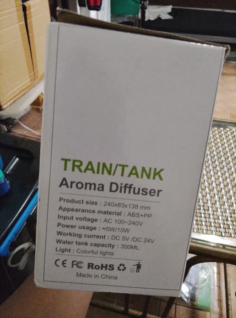 Train Tank Aroma Diffuser Humidifier (Category: Home Fragrance) located in Makati City. Submitted by kervstaniegra (Listing ID 1467236545, Image 3). Description: Unique 2-in-1 train and tank aroma diffuser. Ultrasonic technology with warm and colorful lights. Includes timing function and 300ml water tank capacity. Made from ABS and PP material. Runs on 5W to 10W power usage. Cool decorative humidifier for rooms and desks..