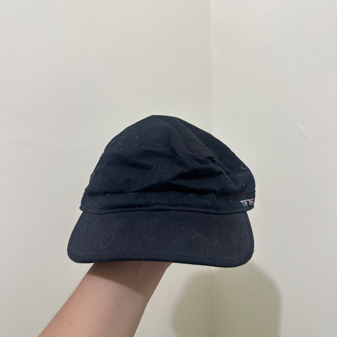 Transnine Black Cotton Cadet Cap Size M (Category: Caps & Hats) located in Bulacan. Submitted by enne_123 (Listing ID 1467299125, Image 3). Description: - Brand/Model: Transnine black cadet hat - Size: M - Material: 100% cotton, made in Taiwan - Design details: Embroidered side branding, custom printed inner lining, and quilted back panel - Condition: Some lint visible on the fabric surface due to normal storage and handling.