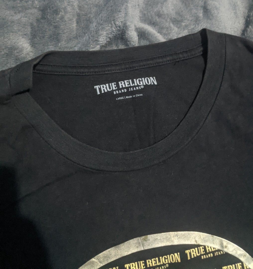 True Religion Buddha (Category: Tshirts & Polo Shirts ) located in San Ildefonso. Submitted by tripniberto (Listing ID 1467327299, Image 2). Description: True Religion Dimes:20.5/27.5L Issue: Need wash, nawala na gold color dun sa buddha face, sign of use Color Rate: 9/10(or better) (lighting may affect the color on images) MOP: gcash MOD: j&t(+sf) NO RUSH SHIPPING!!! (3-5days Ship out!) please manage your expectations this is ukay items PM if in