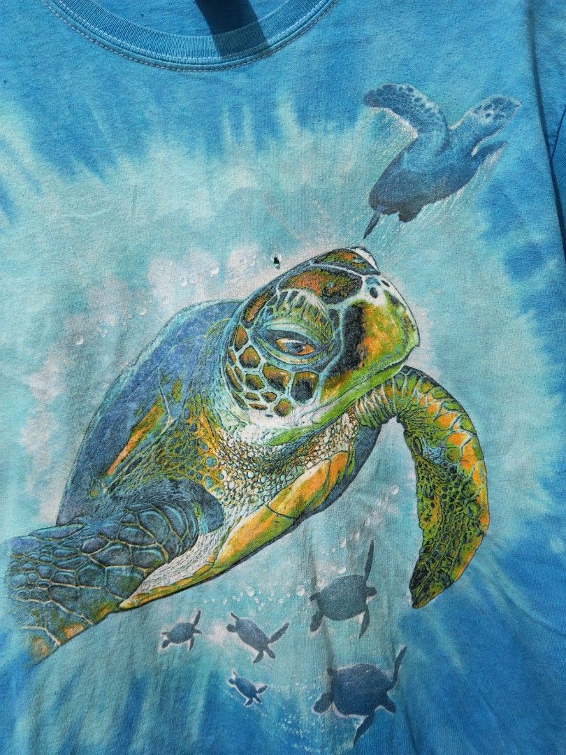 Turtles Dye (Category: Tshirts & Polo Shirts ) located in Taguig. Submitted by thriftedminds (Listing ID 1467218994, Image 2). Description: Item: Tie Dye (Turtles)🔥 ‎Size: Medium (Gildan Heavy Cotton Tag) ‎Width: 20 ‎Length: 28.5 ‎Condition: Excellent ‎Issue: Pinhole, Loose Stitching on Sleeve, Hairline DM to purchase 📩.