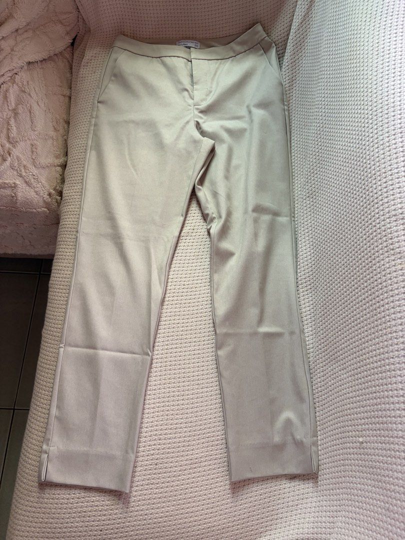 Twentyfourseven Size 34 (Category: Other Bottoms) located in Manila. Submitted by amilannnn (Listing ID 1467196731, Image 1). Description: - Brand: twentyfourseven - Size: 34 (label inside waistband) - Color: Light beige - Style: Tailored look with neat front pleats and side pockets - Fabric: Structured and smooth finish - Versatile: Great for office wear or smart casual weekends .