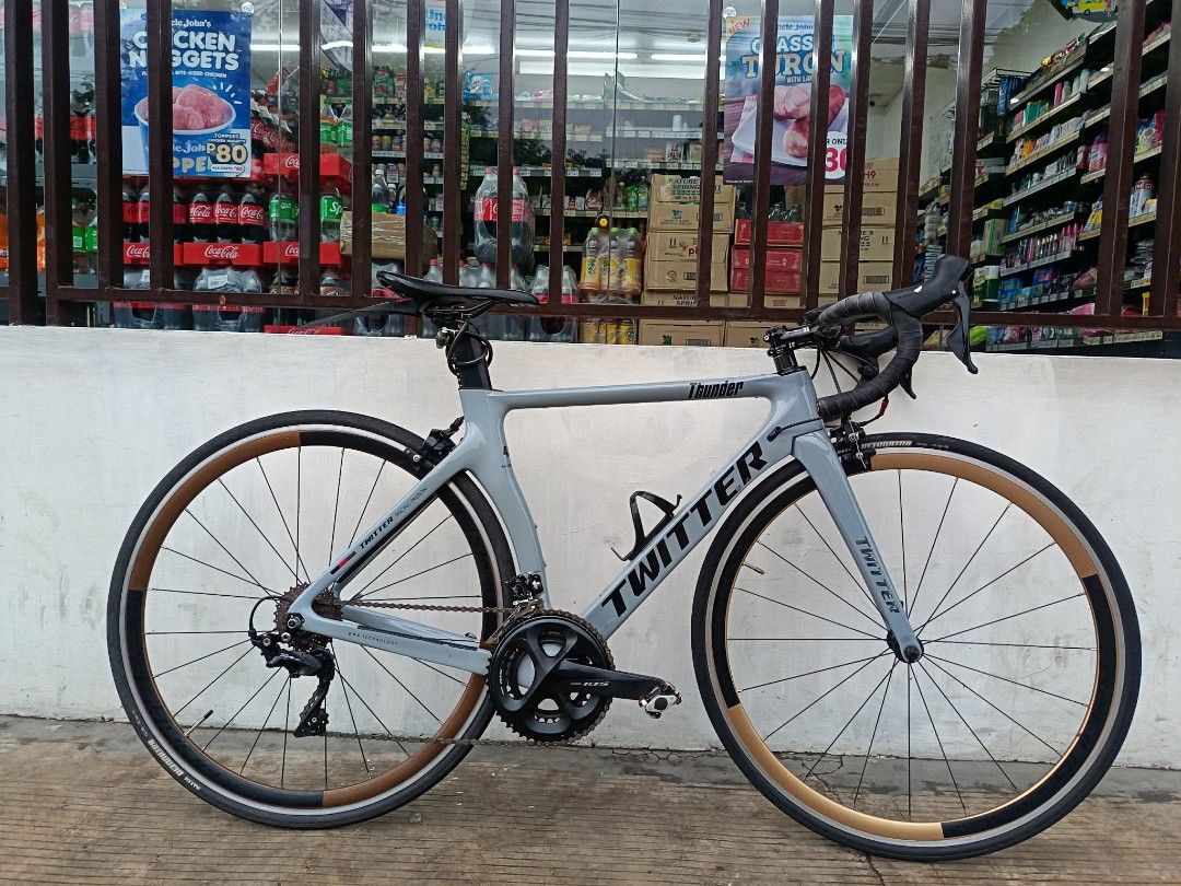 Twitter Thunder Road Bike Grey (Category: Bicycles) located in Manila. Submitted by johnluis.16 (Listing ID 1467285983, Image 3). Description: FOR SALE: TWITTER THUNDER AERO ROADBIKE SZ 48 ✅ SHIMANO 105 R7000 GROUPSET 2X11 SPEED ✅ SHIMANO 105 RIM BREAKS F&B ✅ SHIMANO 105 STI LEVERS ✅ SHIMANO 105 CRANK SET WITH MTB CLEATS ✅ CARBON TWITTER THUNDER FRAME ✅ CARBON ZIPP DROPBAR ✅ 3T ARX STEM ✅ RETROSPEC HUBS ✅ XOSS G+ Computer ✅ MAXXIS DETONATOR TIRES