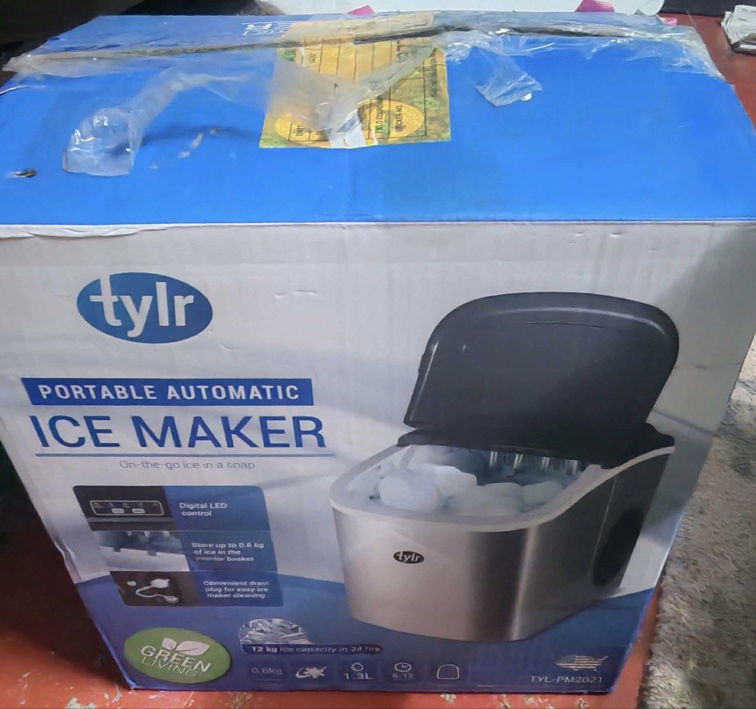 tylr Portable Automatic Ice Maker TYL-PM2021 (Category: Refrigerators and Freezers) located in Manila. Submitted by designerbr74373 (Listing ID 1467241183, Image 1). Description: - Brand: Tylr - Model: TYL-PM2021 - Condition: Brand new, still packed in original box - Capacity: Makes up to 12 kg of ice in 24 hours - Water Tank: 1.3L capacity - Storage Basket: 0.6kg interior storage - Features: Digital LED control panel and convenient drain plug - 