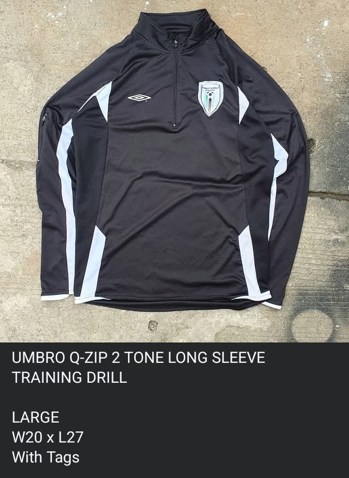 Umbro Q-Zip 2 Tone Long Sleeve Training Drill (Category: Activewear) located in Cavite. Submitted by josephnl (Listing ID 1467350344, Image 3). Description: - Brand: Umbro - Style: Long sleeve quarter-zip training drill top - Color: Black with white contrast panels - Logos: Embroidered Umbro diamond logo and Power Player Academy crest - Material: 100% polyester - Condition: Like new with tags attached - Size: Large (approx. 20" width x 27" length