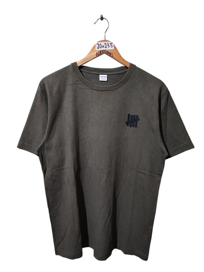 UNDEFEATED ICON LOGO MULLET TEE (Category: Tshirts & Polo Shirts ) located in Iloilo. Submitted by gooddimes (Listing ID 1467354602, Image 1). Description: Undefeated Icon Logo Mullet Tee Authentic Olive green color Size on tag: Medium Dimes: 20Wx27.5L Issue/s: Minimal sign of usage Color rate: 9/10 Excellent condition ₱750 Reminders: - All items are thrifted, please manage your expectations - Color may vary due to lighting - Please wash before u