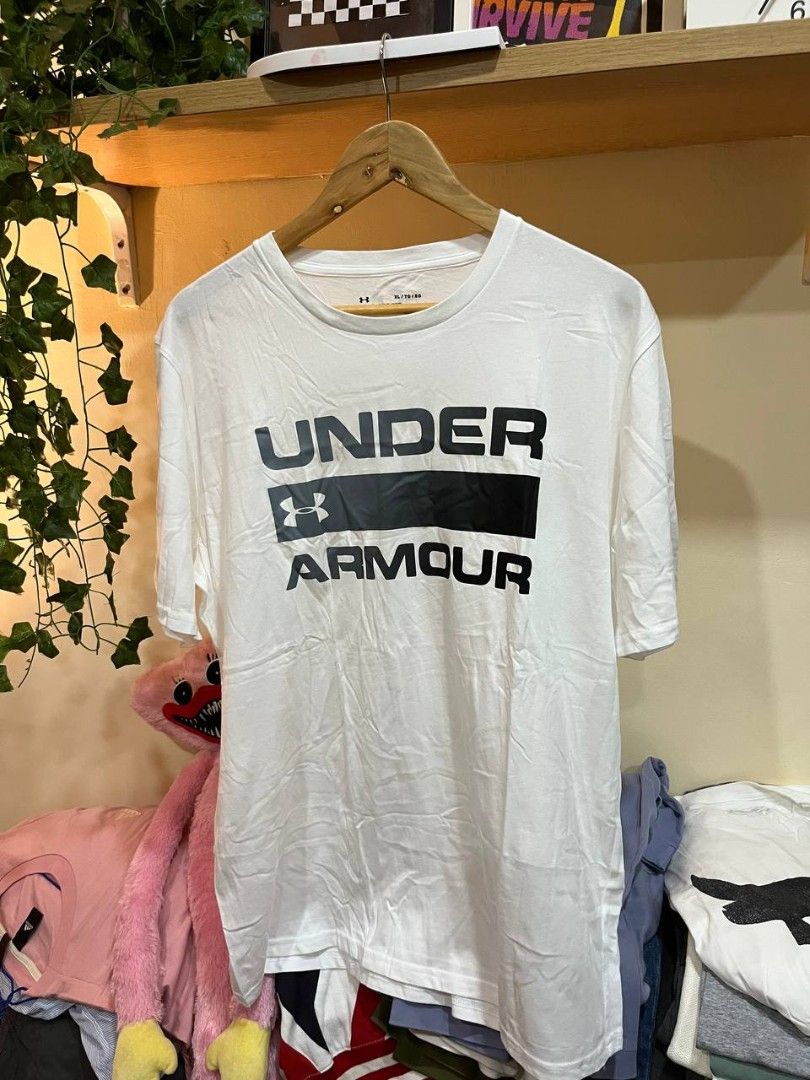 Under Armour Active wear T shirt (Category: Activewear) located in Quezon City. Submitted by michypeachyy1 (Listing ID 1467254754, Image 1). Description: 250 plus shipment XL size.