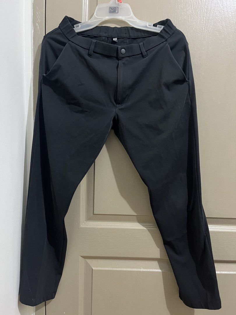 Uniqlo Black Ultra Stretch Active Pants Size S (Category: Jeans) located in Manila. Submitted by graciela.007 (Listing ID 1467334802, Image 1). Description: - Brand: Uniqlo - Color: Solid Black - Size: Small - Material: Lightweight synthetic with great stretch - Features: Drawstring waistband, button closure, and back right hip zipper pocket.
