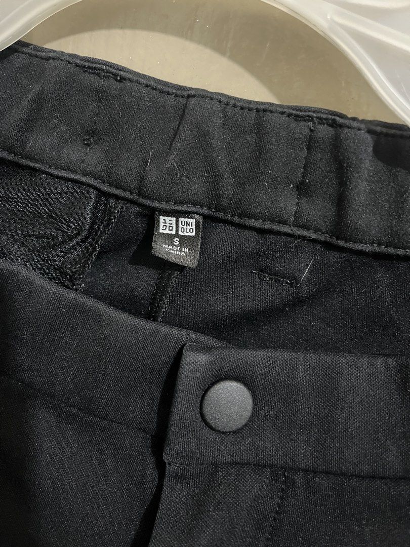 Uniqlo Black Ultra Stretch Active Pants Size S (Category: Jeans) located in Manila. Submitted by graciela.007 (Listing ID 1467334802, Image 3). Description: - Brand: Uniqlo - Color: Solid Black - Size: Small - Material: Lightweight synthetic with great stretch - Features: Drawstring waistband, button closure, and back right hip zipper pocket.