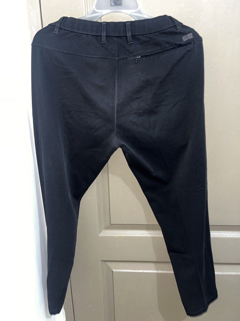 Uniqlo Black Ultra Stretch Active Pants Size S (Category: Jeans) located in Manila. Submitted by graciela.007 (Listing ID 1467334802, Image 2). Description: - Brand: Uniqlo - Color: Solid Black - Size: Small - Material: Lightweight synthetic with great stretch - Features: Drawstring waistband, button closure, and back right hip zipper pocket.