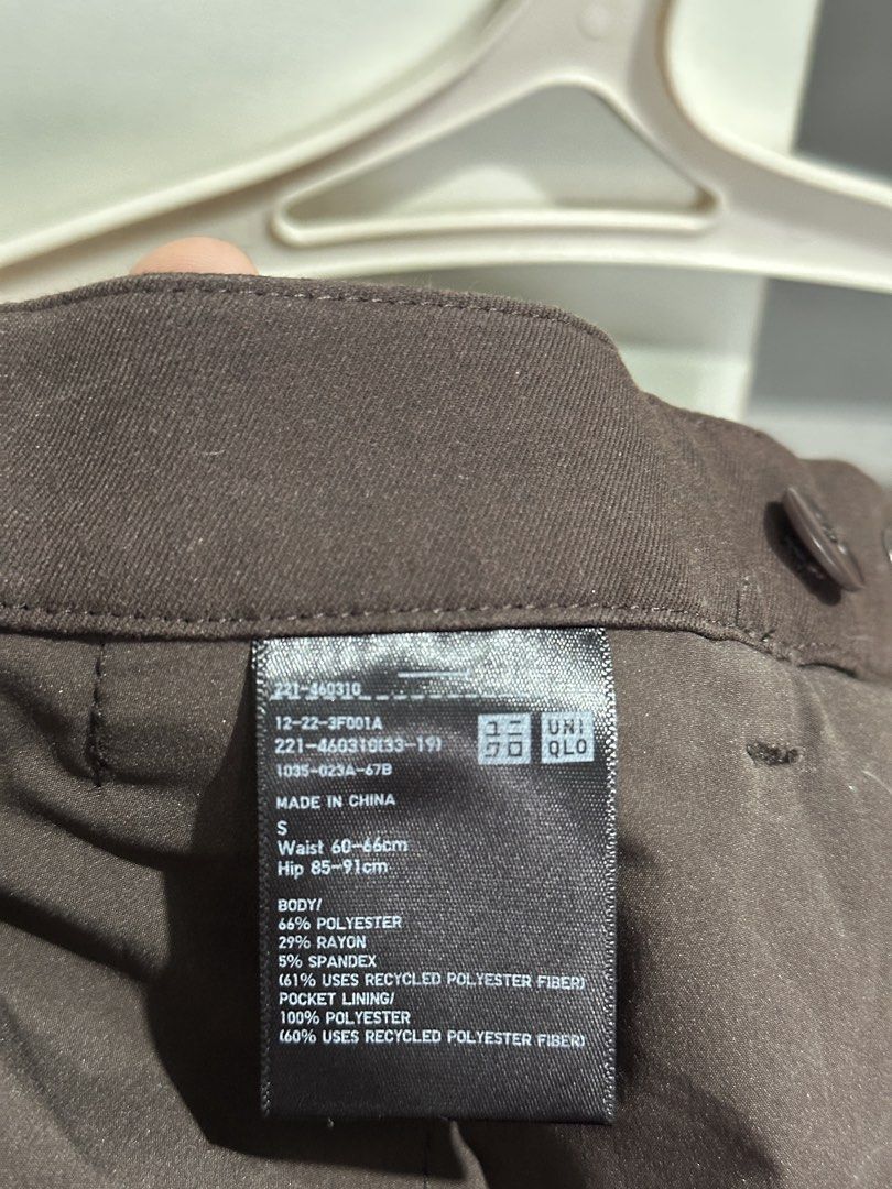Uniqlo Brown Trousers Size S (Category: Other Bottoms) located in Valenzuela. Submitted by crzrvll26 (Listing ID 1467202825, Image 3). Description: - Brand: Uniqlo - Item: Dark Brown Trousers - Size: S (Waist: 60-66cm, Hips: 85-91cm) - Material: Comfortable polyester, rayon, and spandex blend - Versatile dark brown shade, easy to style for work or casual days - Features: Standard zip fly, belt loops, and functional back welt pockets - Condition: 