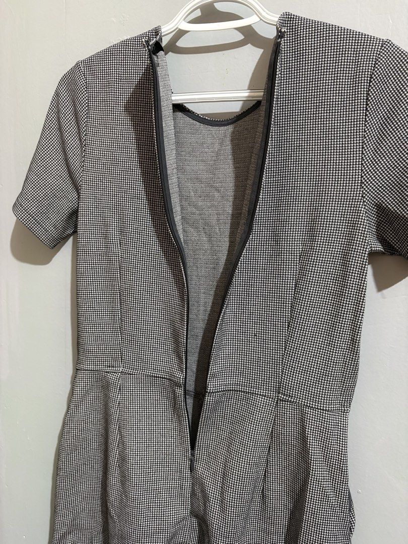 Uniqlo Houndstooth Short Sleeve Romper Size M (Category: Rompers) located in Manila. Submitted by margascloset_ (Listing ID 1467306311, Image 3). Description: Uniqlo Classic black and white houndstooth romper shorts - Design: Short sleeves, crew neck, and tailored waistline - Features: Convenient side pockets and back zipper with hook-and-eye closure - Condition: like new, worn only once.