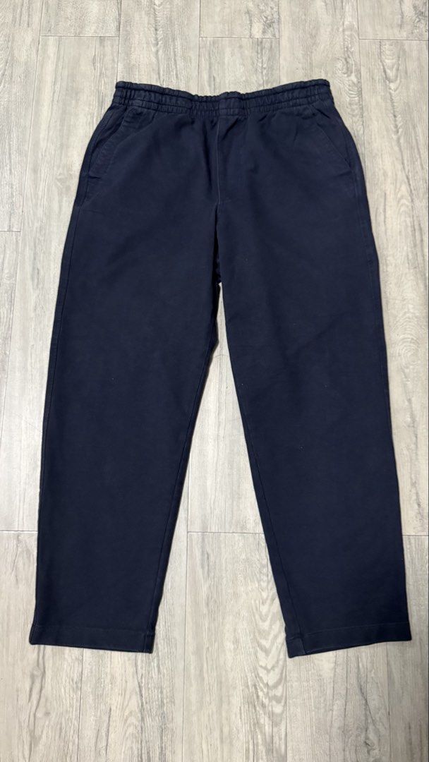 Uniqlo Navy Easy Pants Large (Category: Trousers) located in Caloocan City. Submitted by kobeeeee_12 (Listing ID 1467227813, Image 1). Description: - Brand: Uniqlo - Color: Navy - Size: Large (L) - Material: 96% cotton, 4% spandex (comfortable stretch fabric) - Features: Elastic waistband, front pockets, and two back pockets - Fit: Simple, everyday casual fit.