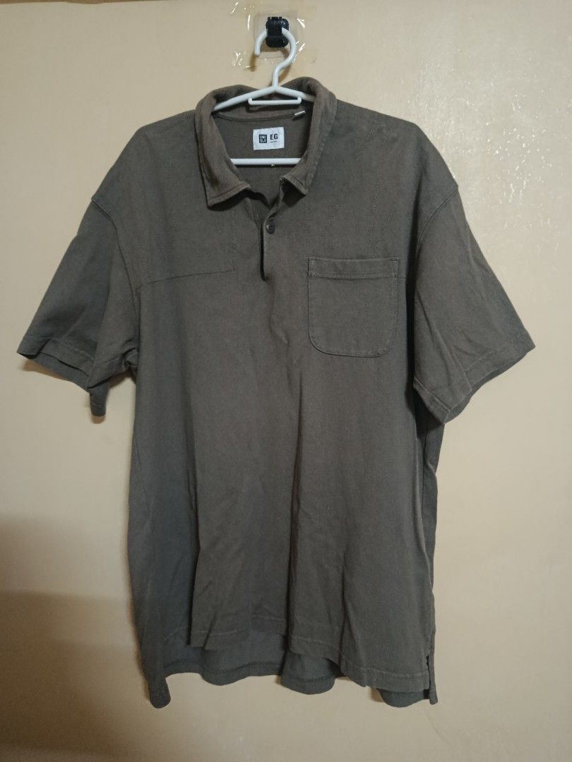Uniqlo x Engineered Garments Oversized Polo (Category: Tshirts & Polo Shirts ) located in Quezon City. Submitted by eldridge12 (Listing ID 1467339208, Image 1). Description: 📌 sun fade on last slide color: 10/10 condition: 7/10 mop: gcash/maya/maribank pm for dimes!.