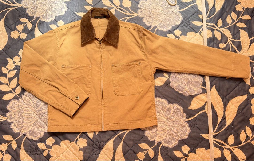 Uniqlo Zip up Short Jacket Size S (Category: Coats, Jackets and Outerwear) located in Malolos. Submitted by kriscapsule (Listing ID 1467198975, Image 2). Description: - Brand: Uniqlo - Style: Zip up short jacket - Color: Beige with brown corduroy collar contrast - Size: Small - Material: Cotton blend - Closure: Full zip front - Pockets: Dual waist patch pockets with metal rivets - Cuffs: Button cuffs - Fit: Easy to layer over a hoodie or t-shirt.