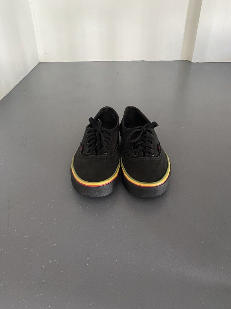 Vans Rasta Stripe (Size US6.5M - 8W) (Category: Sneakers) located in Pasig City. Submitted by silentgem-ac4d (Listing ID 1467291764, Image 2). Description: - Brand: Vans - Style: Low-top lace-up sneakers - Color: Black canvas with multi-color Rasta stripe midsole - Size: US Men 6.5 / US Women 8 / EUR 38.5 / 24.5 cm - Features: Signature waffle outsoles - Condition: Minimal wear on soles, clean uppers, ready to wear.