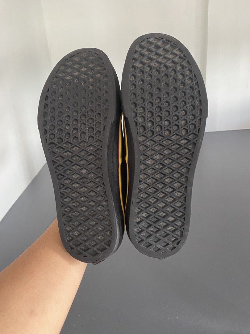 Vans Rasta Stripe (Size US6.5M - 8W) (Category: Sneakers) located in Pasig City. Submitted by silentgem-ac4d (Listing ID 1467291764, Image 3). Description: - Brand: Vans - Style: Low-top lace-up sneakers - Color: Black canvas with multi-color Rasta stripe midsole - Size: US Men 6.5 / US Women 8 / EUR 38.5 / 24.5 cm - Features: Signature waffle outsoles - Condition: Minimal wear on soles, clean uppers, ready to wear.