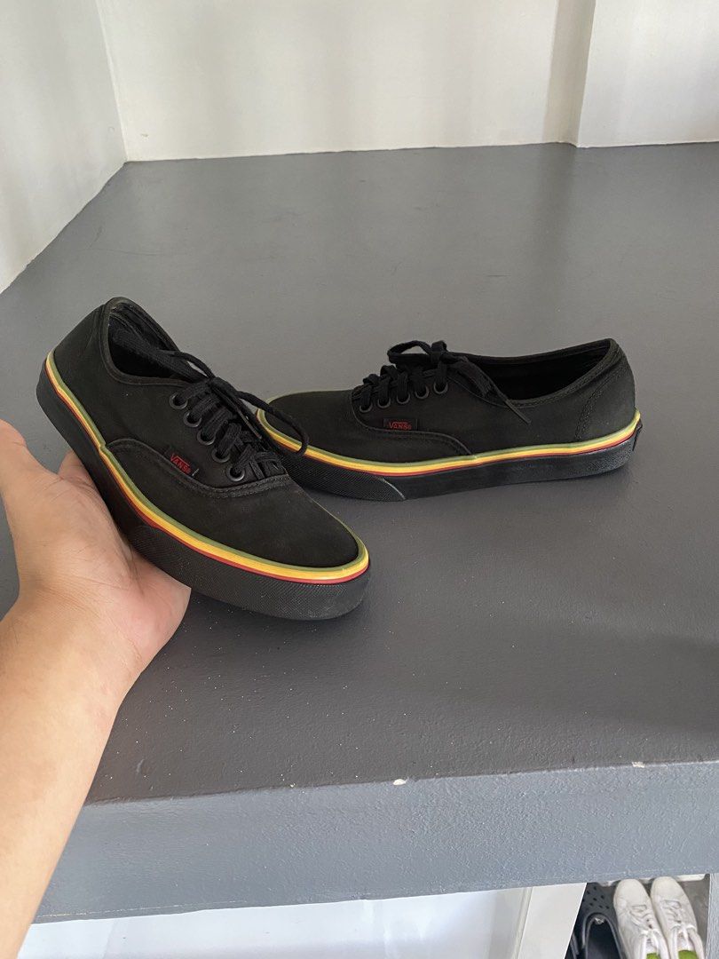 Vans Rasta Stripe (Size US6.5M - 8W) (Category: Sneakers) located in Pasig City. Submitted by silentgem-ac4d (Listing ID 1467291764, Image 1). Description: - Brand: Vans - Style: Low-top lace-up sneakers - Color: Black canvas with multi-color Rasta stripe midsole - Size: US Men 6.5 / US Women 8 / EUR 38.5 / 24.5 cm - Features: Signature waffle outsoles - Condition: Minimal wear on soles, clean uppers, ready to wear.