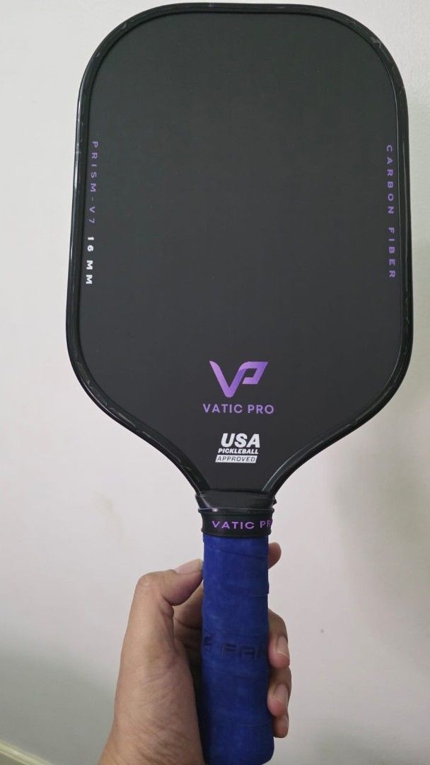 Vatic Pro Prism V7 16mm Pickleball Paddle (Category: Racket and Ball Sports) located in Carmona. Submitted by carrydainty (Listing ID 1467234761, Image 1). Description: - Model: Vatic Pro Prism V7 (16mm thickness) - USA Pickleball approved - Grip: Blue overgrip with VP logo butt cap - For Sale only - Almost New (3 times lang nagamit) - With edge guard and overgrip from DAY 1 - With box and paddle cover - Free extra overgrip (Fangcan) RFS : Upgrad