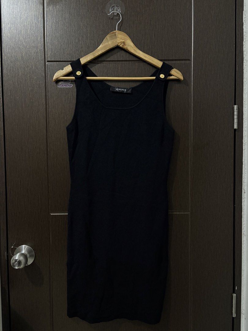 VERSACE BALCK RIBBED KNIT MINI DRESS (Category: Luxury Apparel) located in Naga. Submitted by sislovesme (Listing ID 1467300616, Image 2). Description: •EXCELLENT CONDITION/LIKE NEW •NO FLAWS •AUTHENTIC •SIZE 44 ON TAG •STRETCHY •ARMPIT TO ARMPIT 15.5 INCHES •LENGHT 34.5 INCHES.