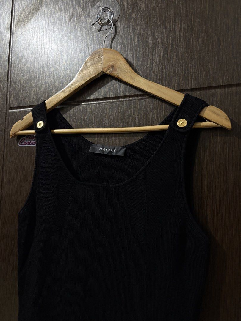 VERSACE BALCK RIBBED KNIT MINI DRESS (Category: Luxury Apparel) located in Naga. Submitted by sislovesme (Listing ID 1467300616, Image 3). Description: •EXCELLENT CONDITION/LIKE NEW •NO FLAWS •AUTHENTIC •SIZE 44 ON TAG •STRETCHY •ARMPIT TO ARMPIT 15.5 INCHES •LENGHT 34.5 INCHES.
