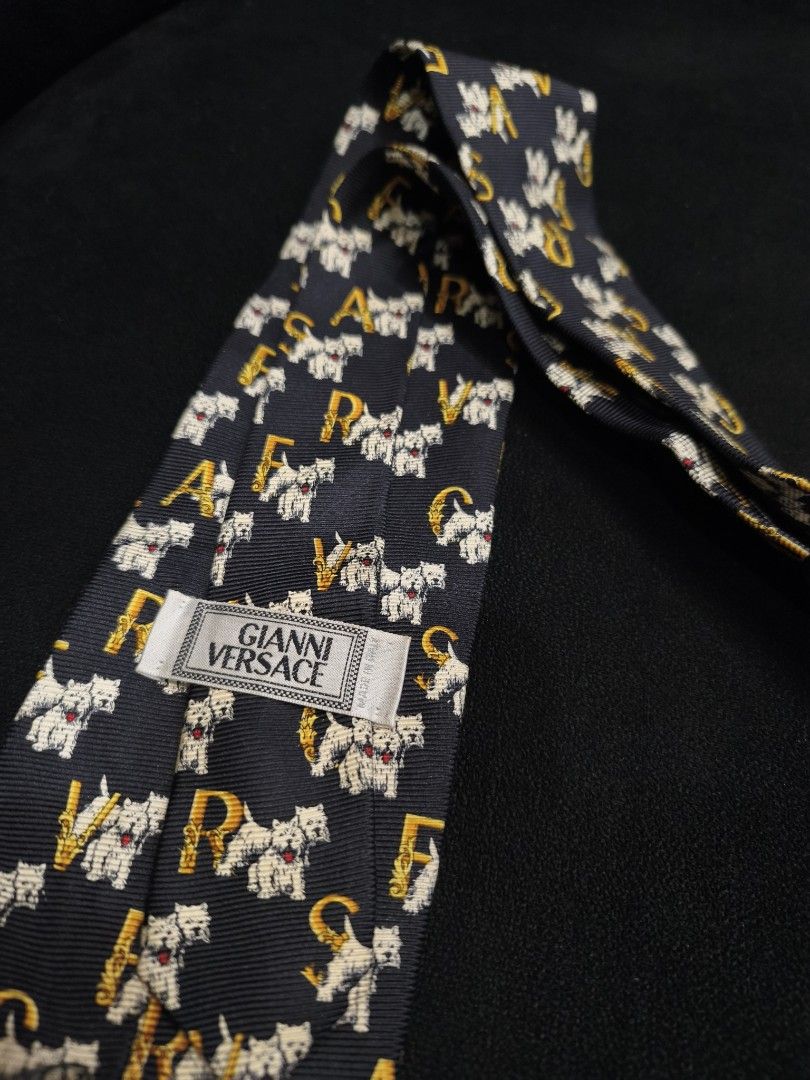 Versace Terrier Script necktie (Category: Luxury Accessories) located in Digos. Submitted by emmanuel28 (Listing ID 1467328307, Image 3). Description: Versace Terrier Script necktie authentic 100% silk material Like new condition No issue Location: Davao del sur Buyer shoulders shipping fee.