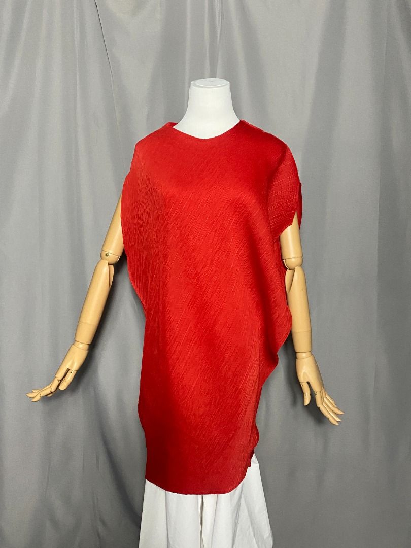 Vibrant red asymmetrical micro-pleated top (Category: Others Tops) located in Las Pinas. Submitted by ipickyou (Listing ID 1467342742, Image 2). Description: Unwashed Condition: 10/10 .