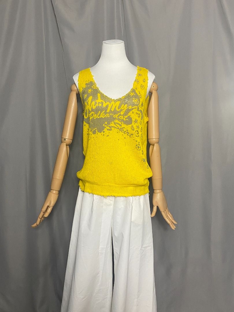Vibrant yellow sleeveless knit top (Category: Sleeveless) located in Las Pinas. Submitted by ipickyou (Listing ID 1467334745, Image 2). Description: Unwashed Condition: 10/10 𝗠𝗲𝗮𝘀𝘂𝗿𝗲𝗺𝗲𝗻𝘁𝘀 𝘄𝗵𝗲𝗻 𝗹𝗮𝗶𝗱 𝗳𝗹𝗮𝘁: -Size 38 -Armpit to armpit: 18” -Length: 25” .