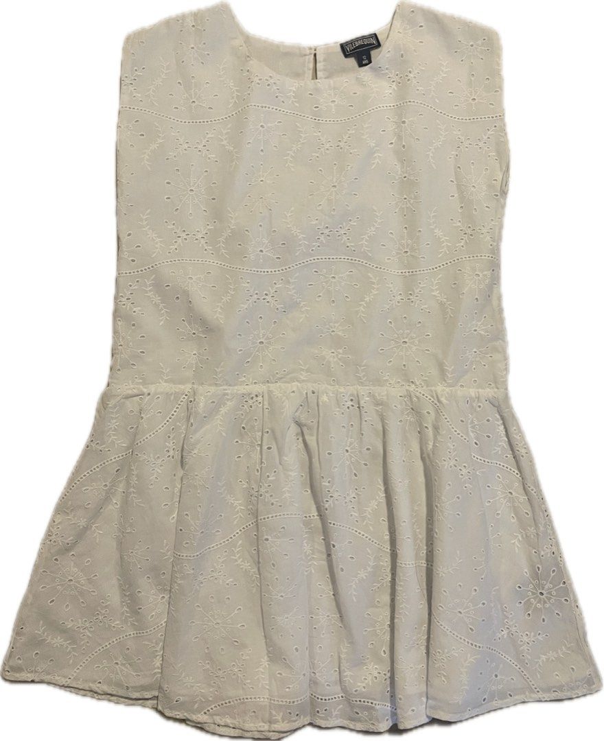 Vilebrequin White Eyelet Dress (Category: Babies & Kids Fashion) located in San Juan City. Submitted by rike_ramirez (Listing ID 1467206055, Image 1). Description: - Brand: Vilebrequin - Size: 12 years old - Material: 100% lightweight cotton - Design: Sleeveless with intricate floral embroidery, dropped waist, and gathered skirt - Details: Scalloped trim and back button closure at the neckline - Condition: Excellent.