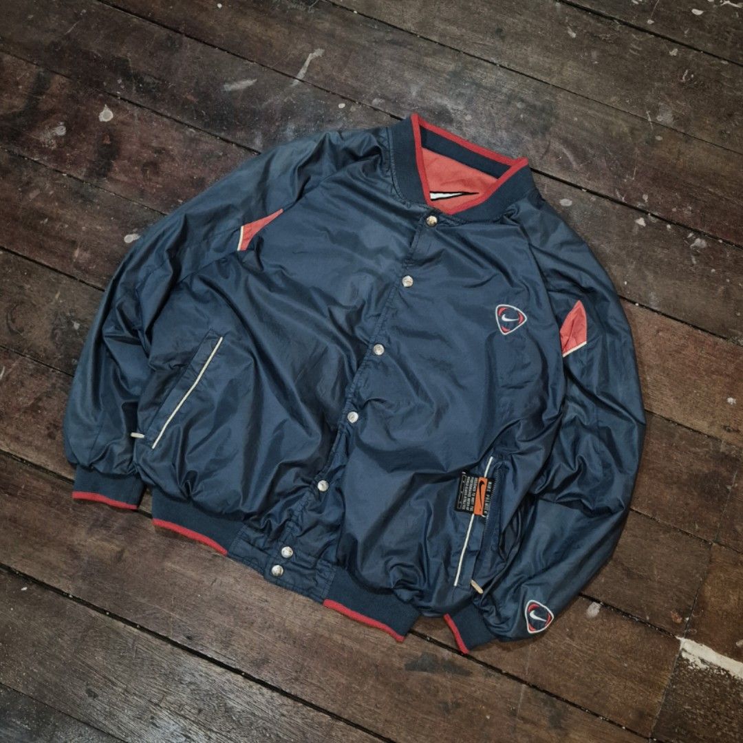 vintage 90s Nike reversible nylon bomber jacket (Category: Coats, Jackets and Outerwear) located in Legazpi City. Submitted by madearchivesofficial (Listing ID 1467294237, Image 1). Description: size: Medium (boxy fit) width: 24in length:27in very good vintage condition issue: pinhole check photo.