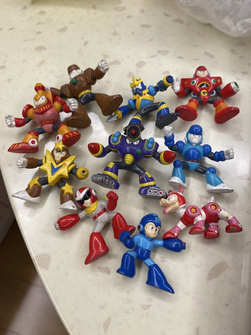 Vintage Action Figures Lot Marvel Mega Man Simpsons Transformers (Category: Action & Battle Toys) located in Manila. Submitted by seesgaragesale (Listing ID 1467313192, Image 2). Description: Vintage toys - Assorted X-Men 10 pcs. As is - Condition: Shows paint wear and scuffs from past play - Sold as set only P4,800.00 Rockman set of 10 - P5,000.00 .