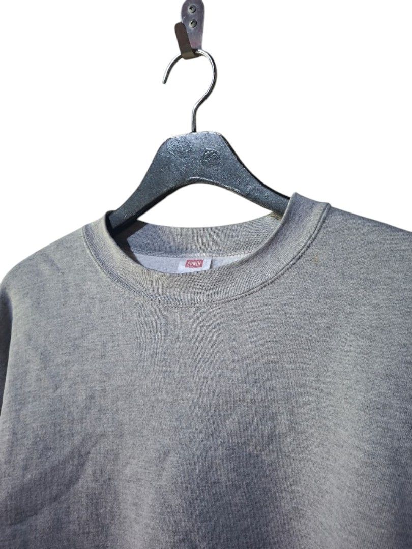 Vintage Edwin Crewneck Sweatshirt (Category: Coats, Jackets and Outerwear) located in San Juan (Cabalian). Submitted by ec8thrift (Listing ID 1467186123, Image 3). Description: - Brand: Vintage Edwin - Origin: Made in USA - Color: Classic Grey - Style: Crewneck sweatshirt - Details: Small woven logo patch on left sleeve - Trims: Ribbed collar, cuffs, and hem - Fit: Comfortable basic piece, perfect for casual everyday wear.