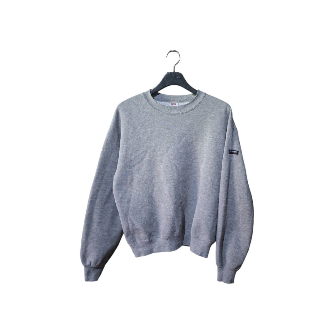 Vintage Edwin Crewneck Sweatshirt (Category: Coats, Jackets and Outerwear) located in San Juan (Cabalian). Submitted by ec8thrift (Listing ID 1467186123, Image 1). Description: - Brand: Vintage Edwin - Origin: Made in USA - Color: Classic Grey - Style: Crewneck sweatshirt - Details: Small woven logo patch on left sleeve - Trims: Ribbed collar, cuffs, and hem - Fit: Comfortable basic piece, perfect for casual everyday wear.