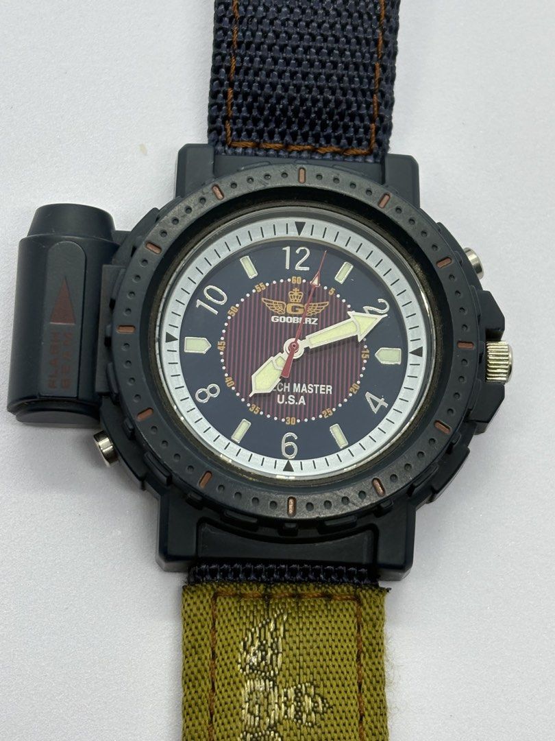 Vintage Field Watch with Flash Beam (Category: Men's Watches) located in Quezon City. Submitted by rentoti (Listing ID 1467286177, Image 1). Description: Up for sale is a rare, vintage Gooberz “Watch Master U.S.A.” quartz field watch in fantastic, fully working condition. This rugged timepiece features a unique built-in side flashlight (flash beam module) mounted on the left side of the case. Perfect for collectors of retro outdoor gear, or anyon