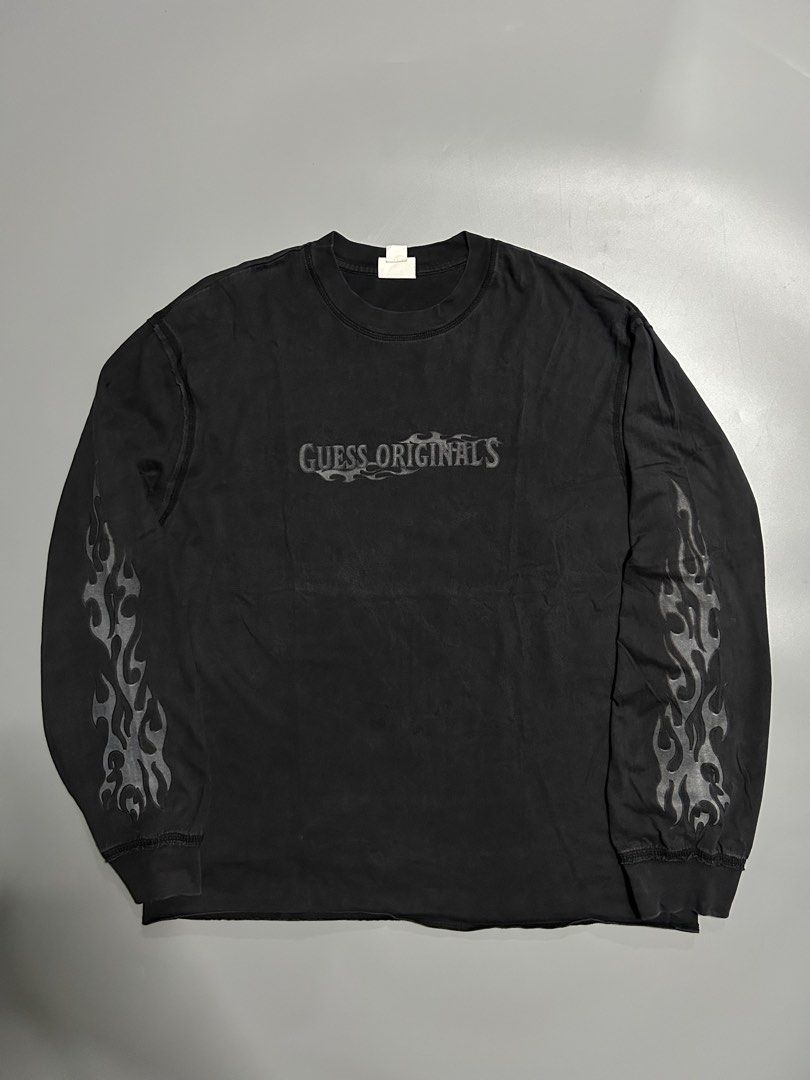 Vintage guess flame longsleeve (authentic) (Category: Hoodies) located in Trece Martires City. Submitted by flip_flips (Listing ID 1467330842, Image 1). Description: Vintage guess flame longsleeve (authentic) -Dimes: 23 width 27 length -Excellent condition -9.4/10 color rate -issue: none.