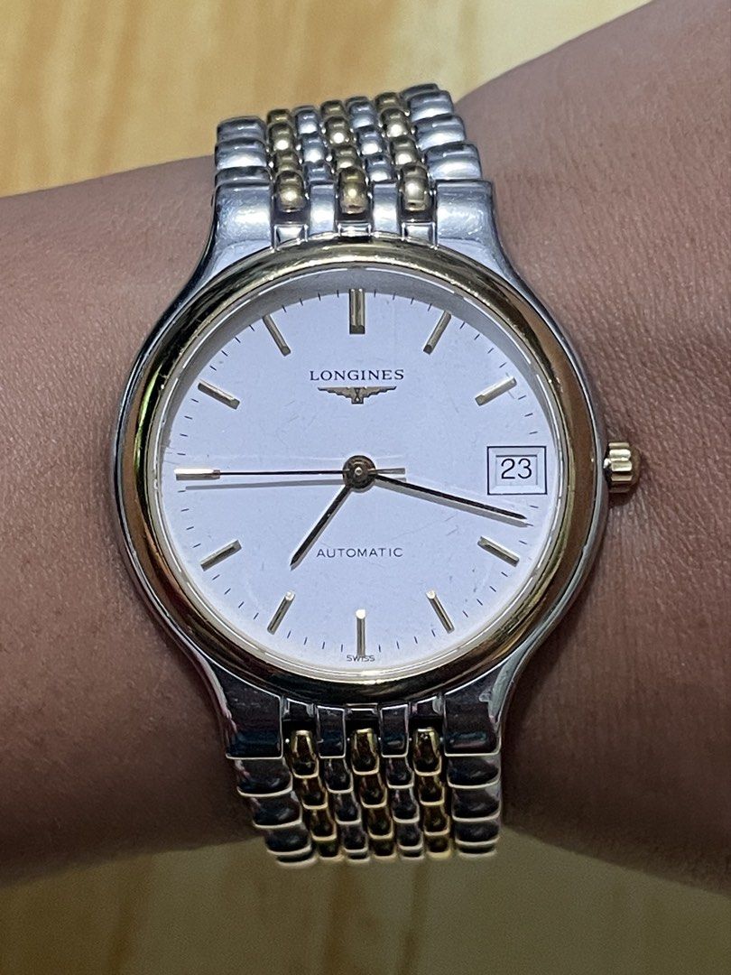 Vintage Longines La Grande (Category: Men's Watches) located in Taguig. Submitted by tester1x (Listing ID 1467279290, Image 1). Description: Vintage Longines La Grande Swiss Made L5 634 3 26577880 Automatic White Dial Sapphire Crystal Gold Plated Bezel Two Tone Stainless Steel Case & Bracelet 34mm 7inch wrist size .