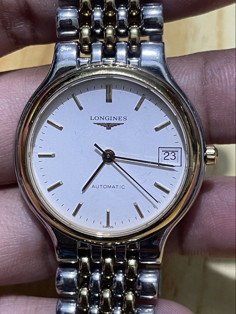 Vintage Longines La Grande (Category: Men's Watches) located in Taguig. Submitted by tester1x (Listing ID 1467279290, Image 3). Description: Vintage Longines La Grande Swiss Made L5 634 3 26577880 Automatic White Dial Sapphire Crystal Gold Plated Bezel Two Tone Stainless Steel Case & Bracelet 34mm 7inch wrist size .