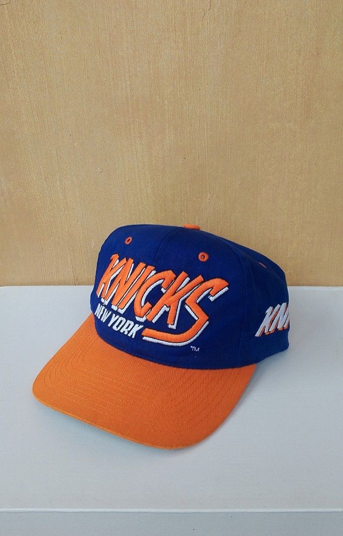 Vintage New York Knicks Hat (Category: Caps & Hats) located in Lipa City. Submitted by meechytwotwotwo (Listing ID 1467194697, Image 1). Description: • Vtg New York Knicks Hat - One Size Fits All - Dada Snap - Hairline / 2 missing male button Plss check photos for actual condition additional shipping fee MODE OF PAYMENT: GCASH/NO COD payment first before shipment Thank you..