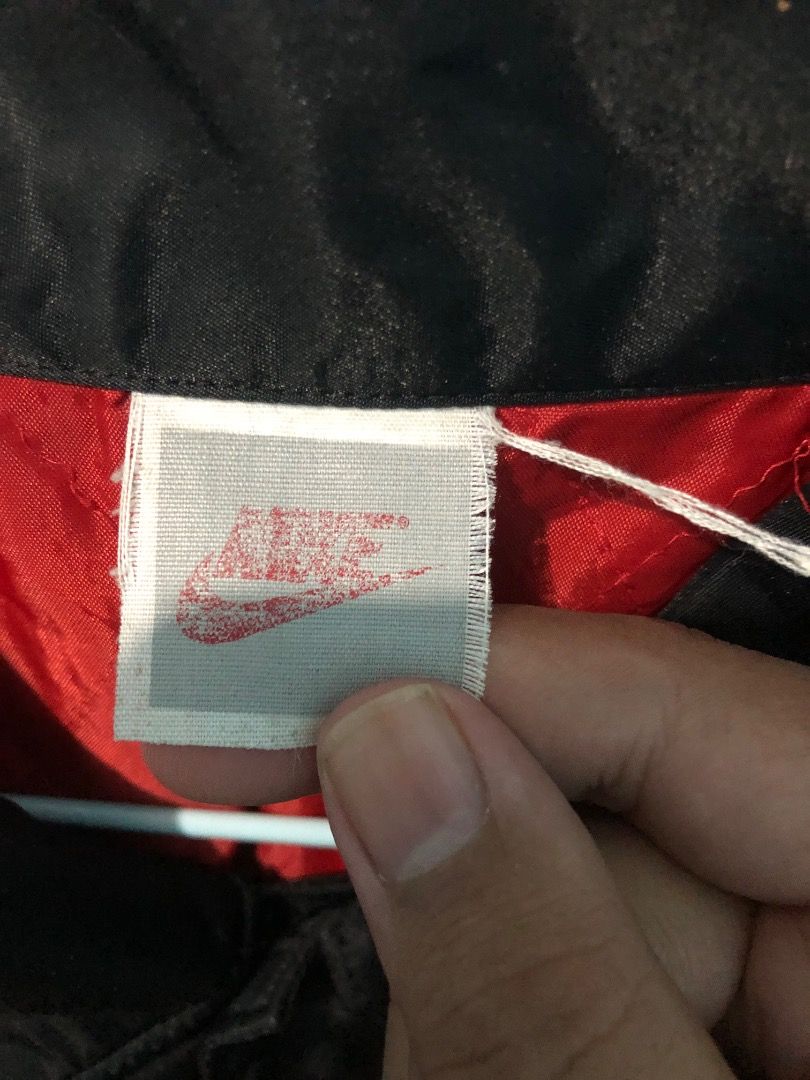 Vintage Nike Rainbow Logo Black Coach Jacket (Category: Coats, Jackets and Outerwear) located in San Fernando. Submitted by unclebob00 (Listing ID 1467321998, Image 2). Description: Vintage Rare Nike rainbow(Coach Jacket) minimal chip crack on back logo 26x32.