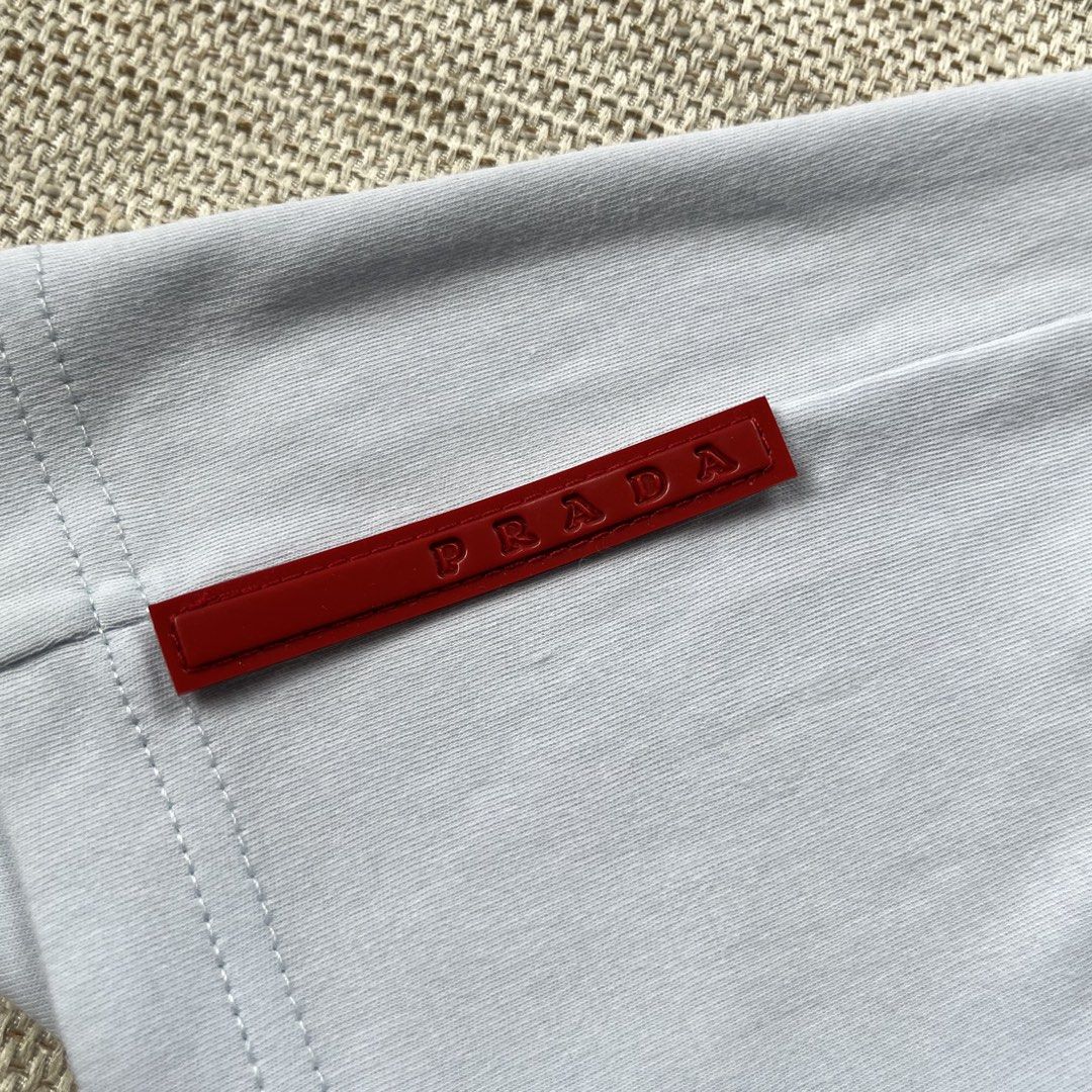 Vintage Prada Polo Shirt (Category: Luxury Apparel) located in Panabo. Submitted by curated.dept (Listing ID 1467275625, Image 3). Description: size medium 21 width, 27 length excellent condition 9.5/10 color rate flawless/no issues PRICE: ₱2000 free shipping.