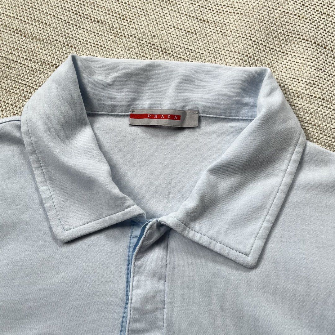 Vintage Prada Polo Shirt (Category: Luxury Apparel) located in Panabo. Submitted by curated.dept (Listing ID 1467275625, Image 2). Description: size medium 21 width, 27 length excellent condition 9.5/10 color rate flawless/no issues PRICE: ₱2000 free shipping.